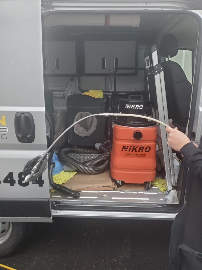 Bee cleaning technician is cleaning air ducts and equipment (57)